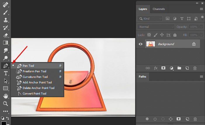 Selecting the Pen Tool from the Photoshop toolbar to create a clipping path